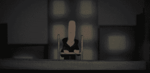 Creative startup woman working on laptop in bright modern office environment.